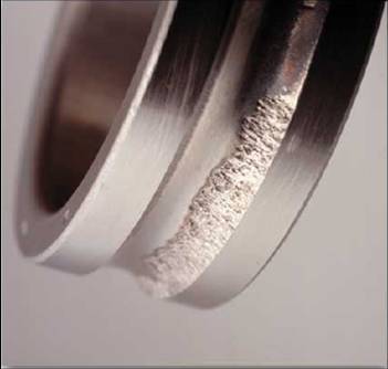 Damage to a bearing from excessive loads