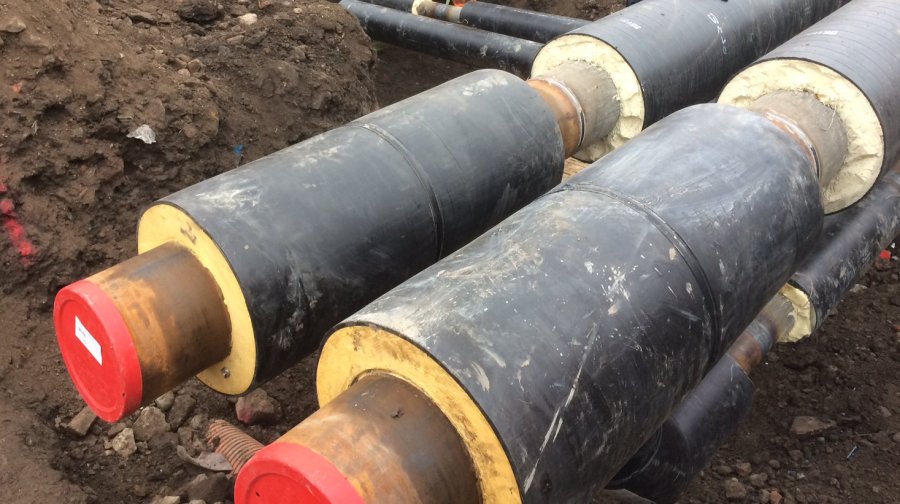 District heating pipes being installed at Queens Quay